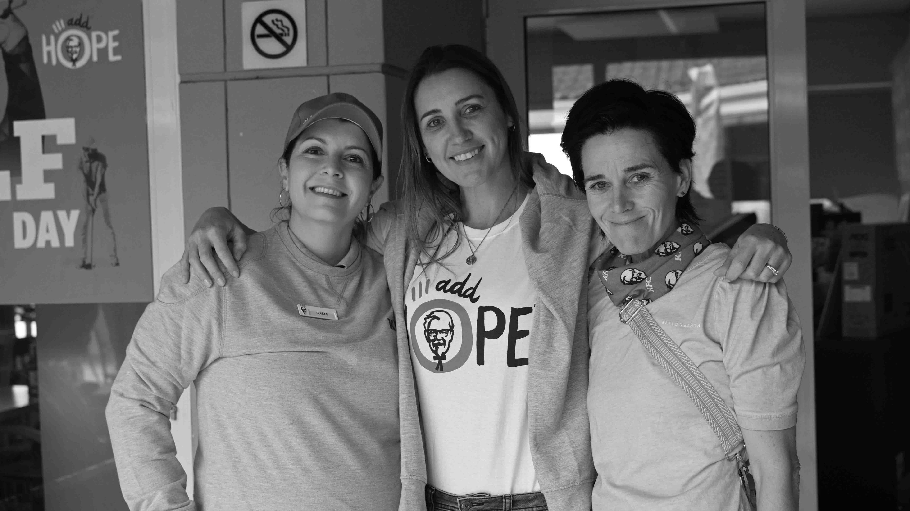 Smiling participants at the golf day.