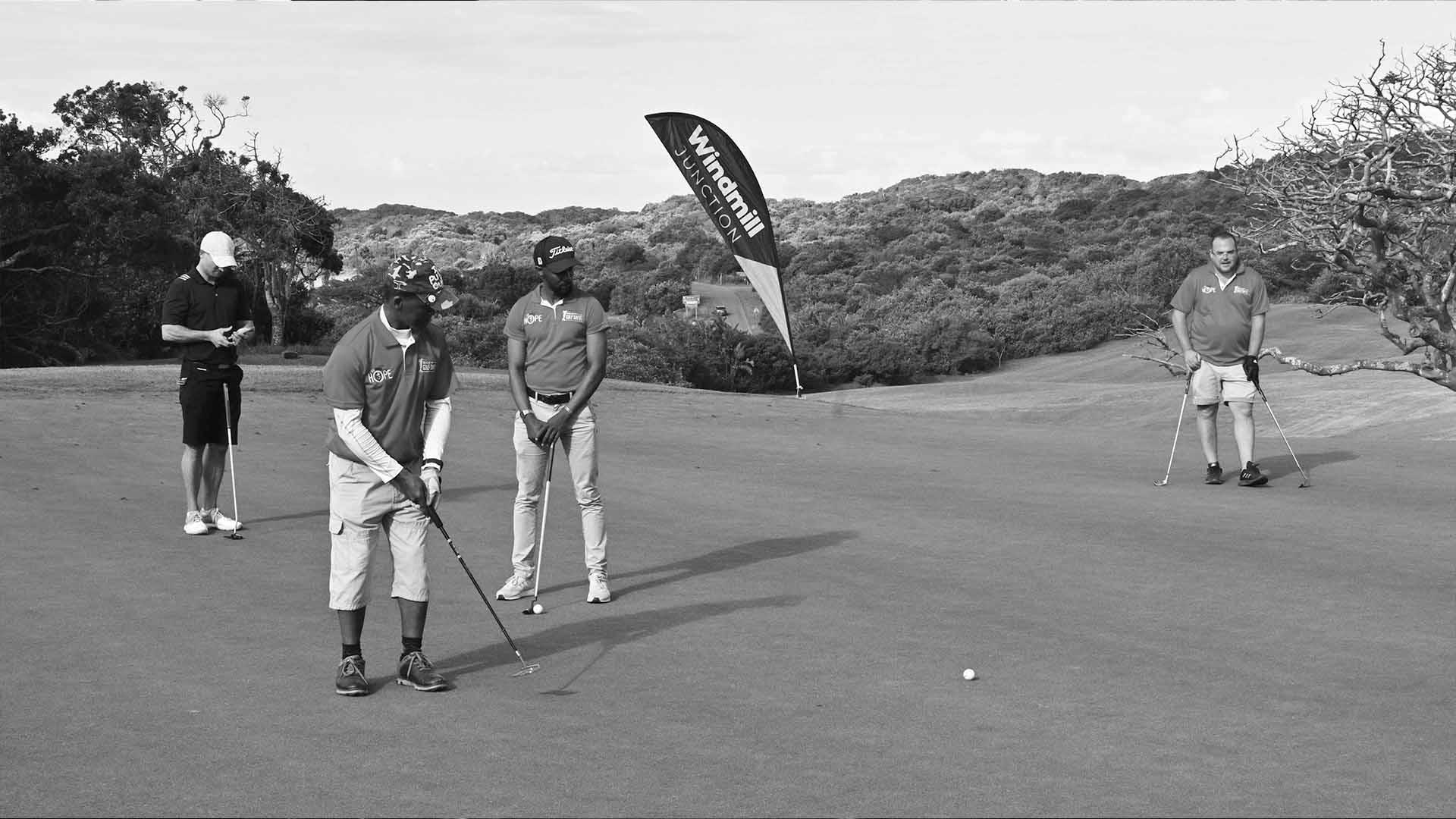 Participants enjoying the atmosphere at the golf day.