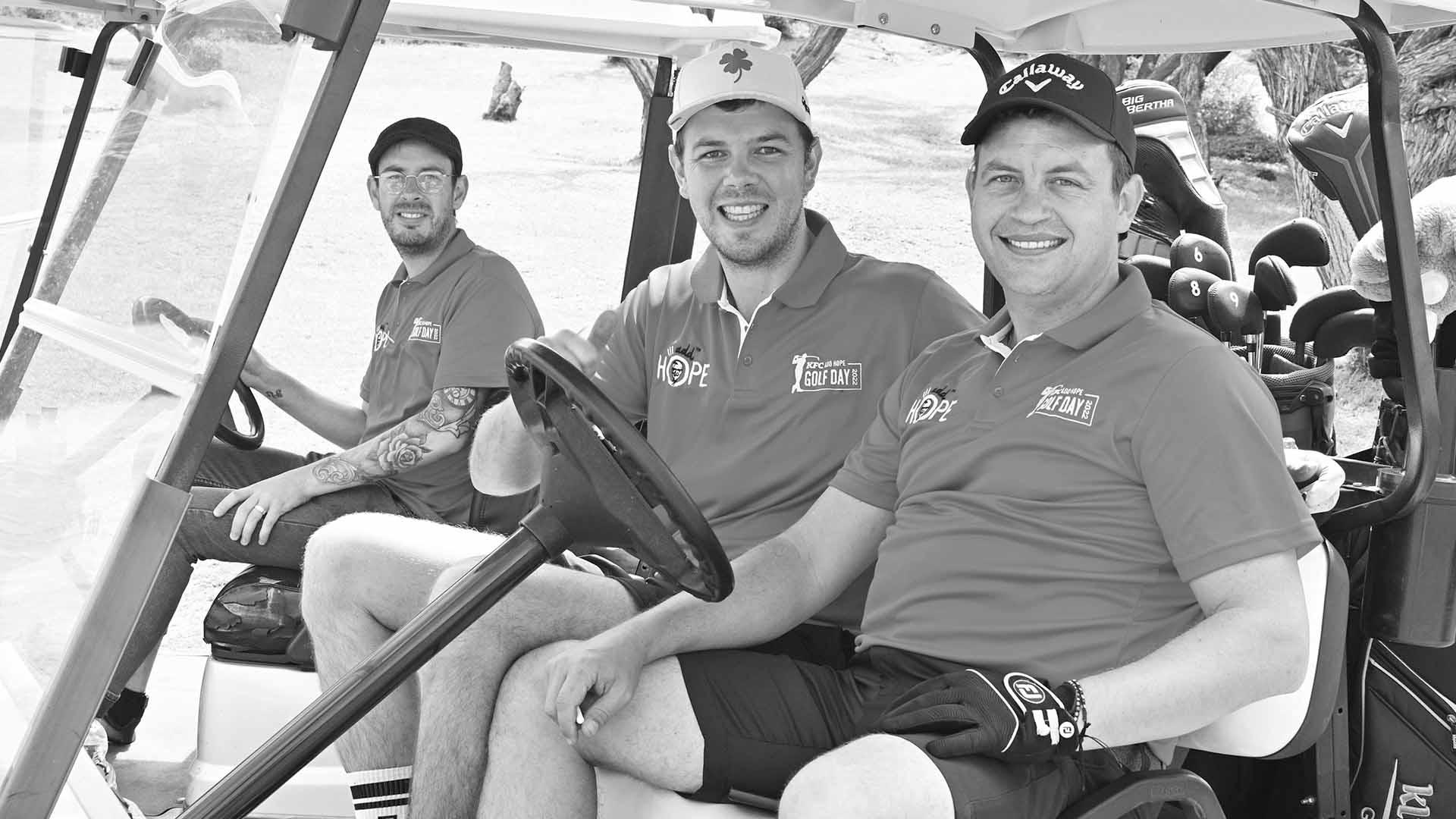 Group photo of attendees and supporters at the charity golf day.