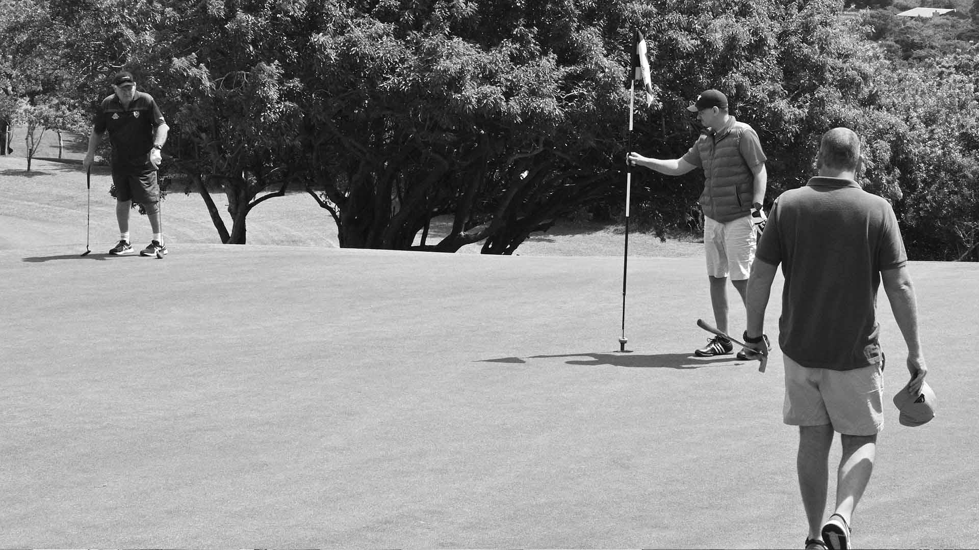 Moments from the award ceremony or closing of the golf event.